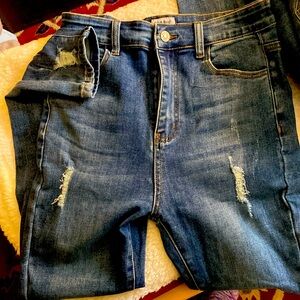 White birch jeans. Distressed on legs and bottom